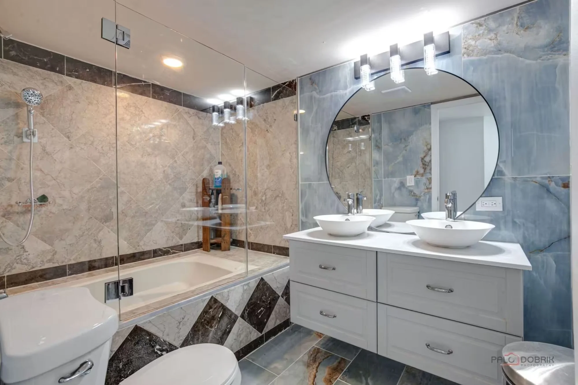 Bathroom with soaking tub at Bluejacket Bungalow